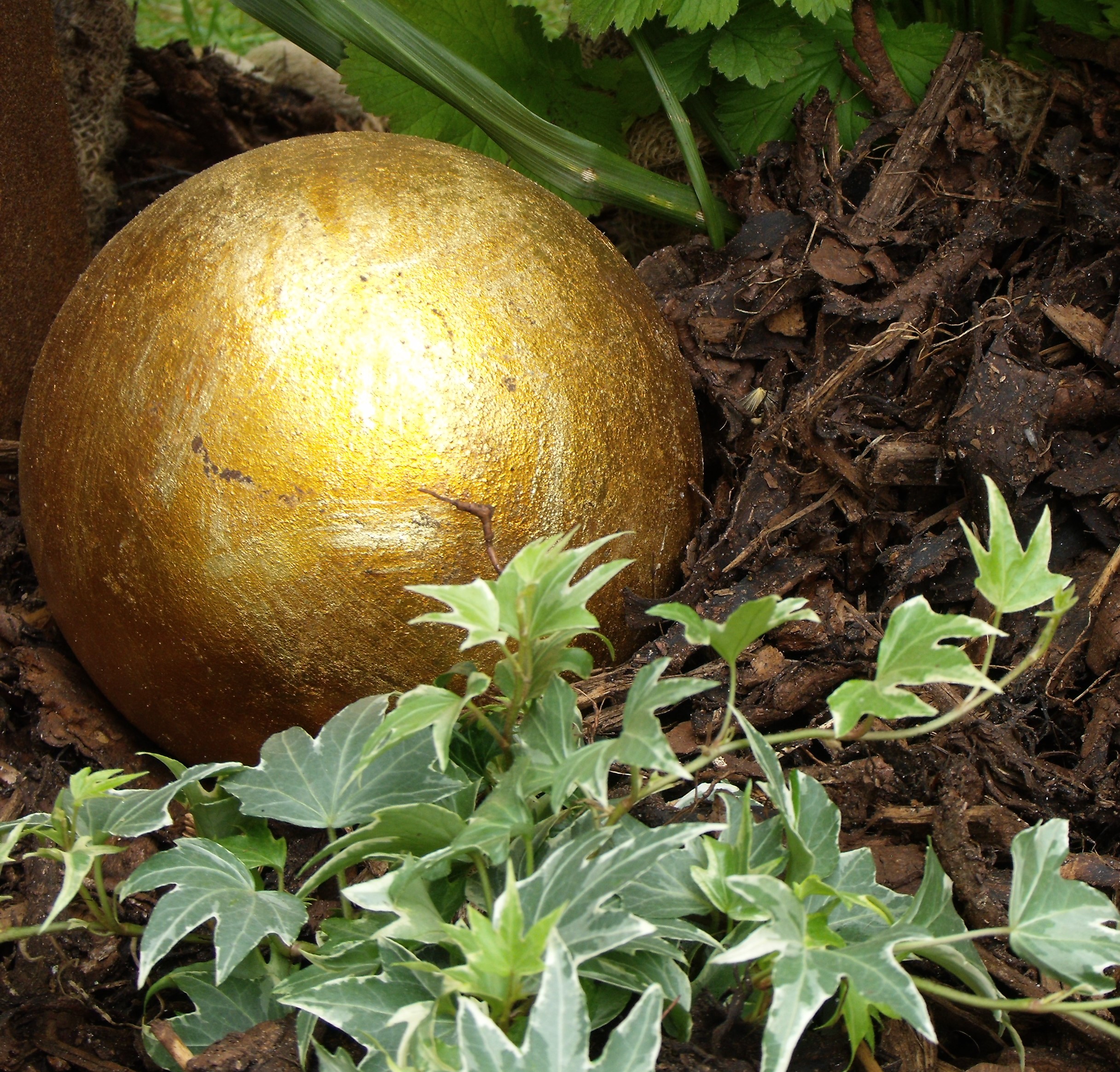 Golden ball Sculpture and Garden Art Golden ball Sculpture and Garden Art
